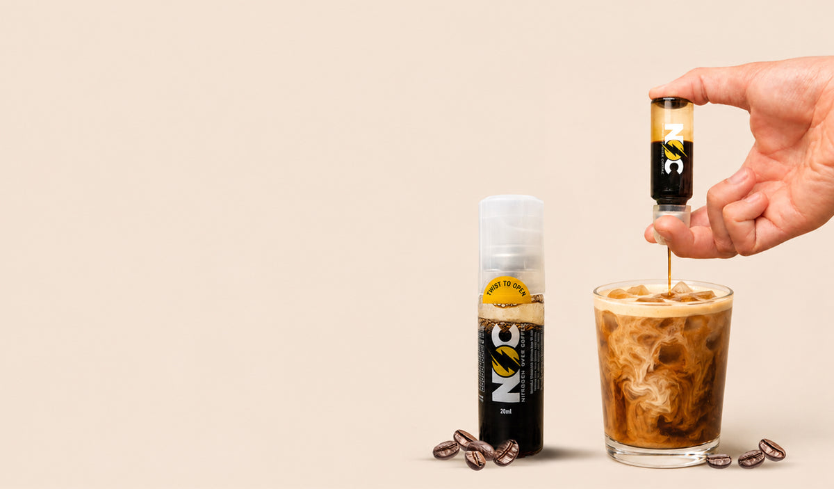Koffelo NOC nitro cold brew shot with roasted coffee beans